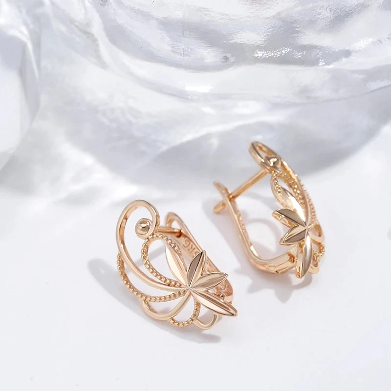 Glossy Hollow Metal Flower 585 Rose Gold Earrings