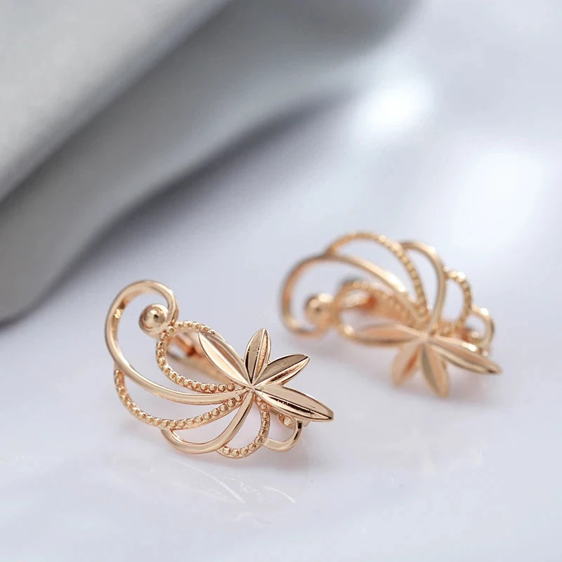 Glossy Hollow Metal Flower 585 Rose Gold Earrings