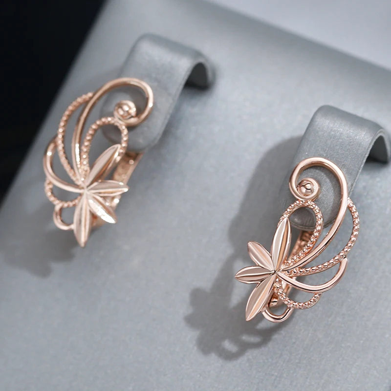 Glossy Hollow Metal Flower 585 Rose Gold Earrings